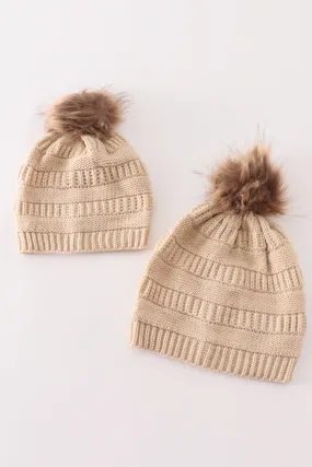 Beige pompom cable beanie